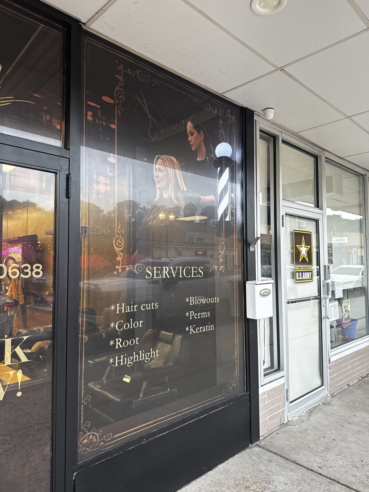 Prestige Barbershop new custom window graphics with branded imagery and service listings