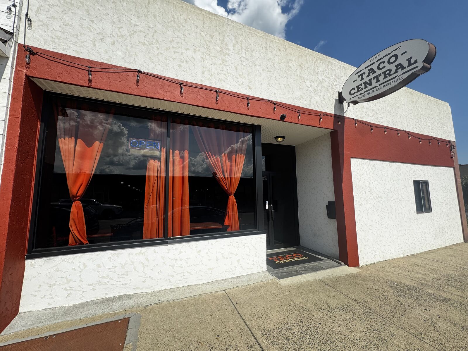 Taco Central storefront before window graphics installation